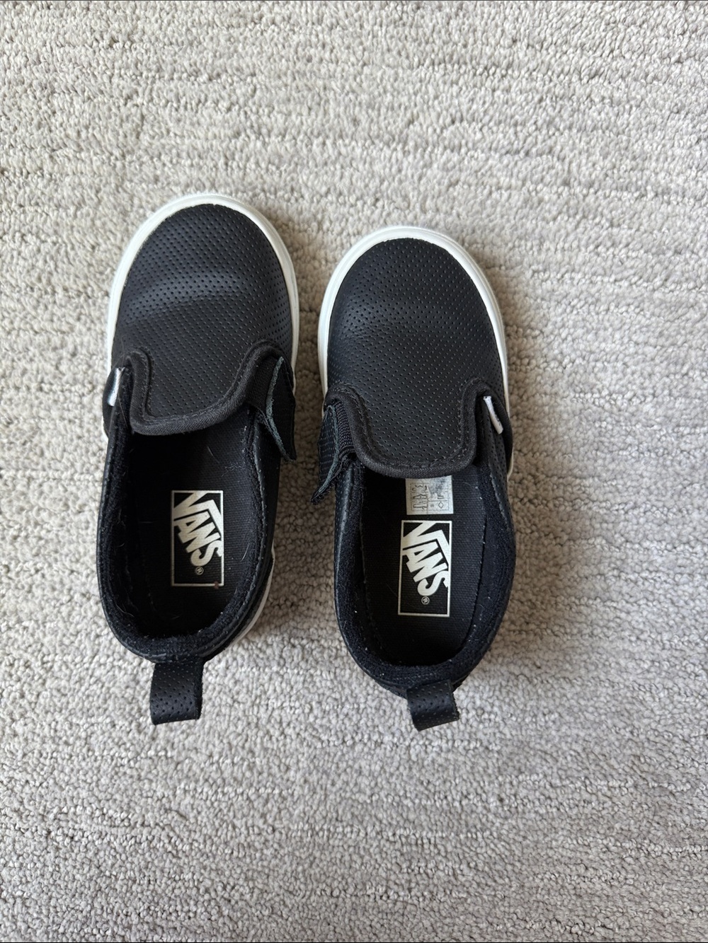 Vans Kids Slip-On Sneakers in Black with White Sole
